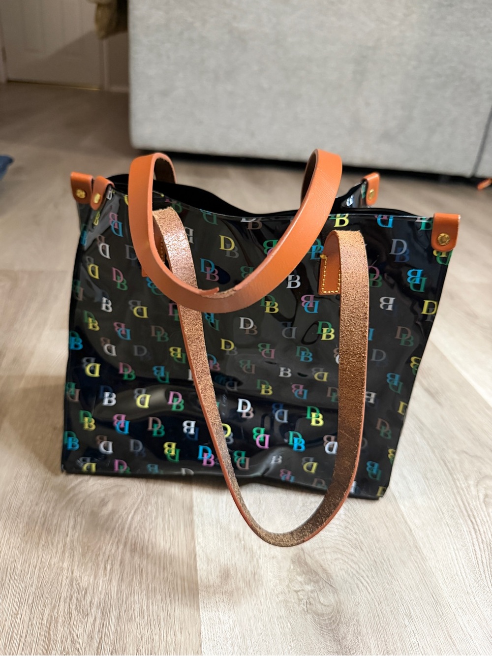 Dooney & Bourke Black Multicolor Print Plastic Tote with Brown  Handles - Picture 2 of 11